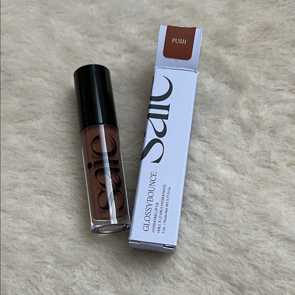 Saie Glossybounce lip oil in Push